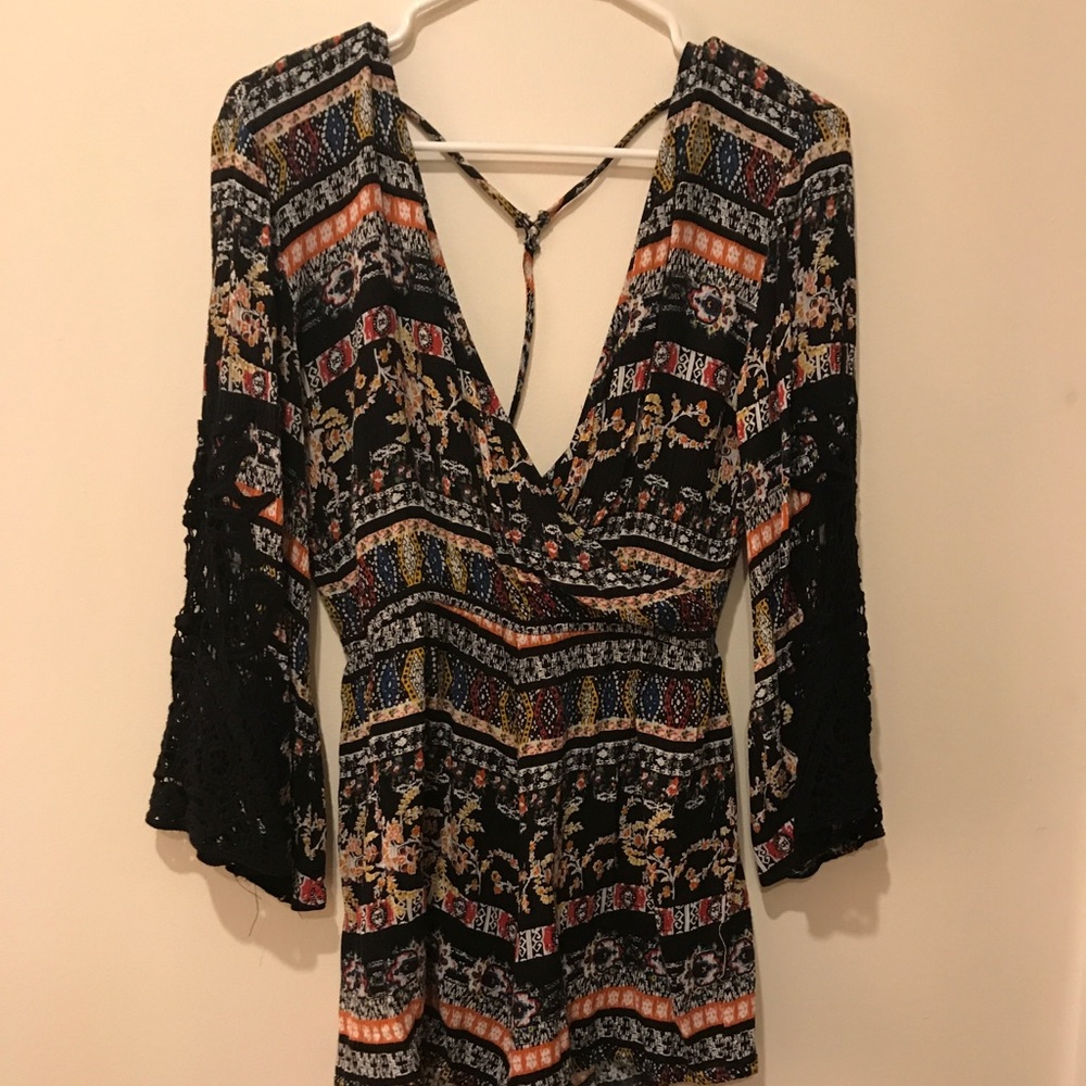 Bell sleeve, long sleeve romper.